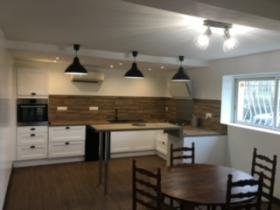 Propriété composée de 2 maisons avec des entrées séparées