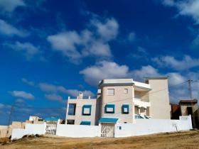 Villa pieds dans l'eau face à l'île Pilau