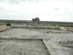 Terrain titré et constructible à vendre par lot