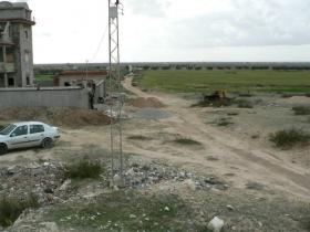 Terrain titré et constructible à vendre par lot