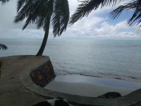 Maison sur une petite île paradisiaque
